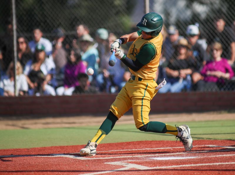 Royal High School outfielder Isaiah Tillman connects with a pitch during a 3-2 loss to Simi Valley May 7, 2025.