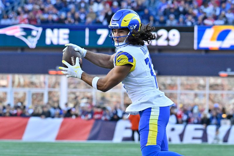 Nov 17, 2024; Foxborough, Massachusetts, USA; Los Angeles Rams wide receiver Puka Nacua (17) makes a catch during the first half against the New England Patriots at Gillette Stadium. Mandatory Credit: Eric Canha-Imagn Images