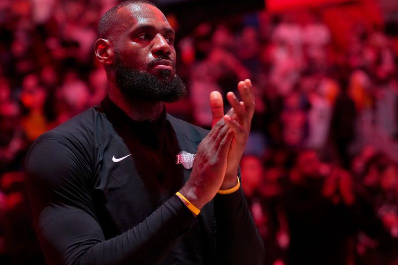 Dec 4, 2024; Miami, Florida, USA; Los Angeles Lakers forward LeBron James (23) during pregame ceremonies before a game against the Miami Heat at Kaseya Center. Mandatory Credit: Jim Rassol-Imagn Images
