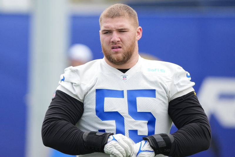 May 28, 2025; Woodland Hills, CA, USA; Los Angeles Rams defensive end Braden Fiske (55) walks out to the practice field during organized team activities at Rams Practice Facility. Mandatory Credit: Kirby Lee-Imagn Images