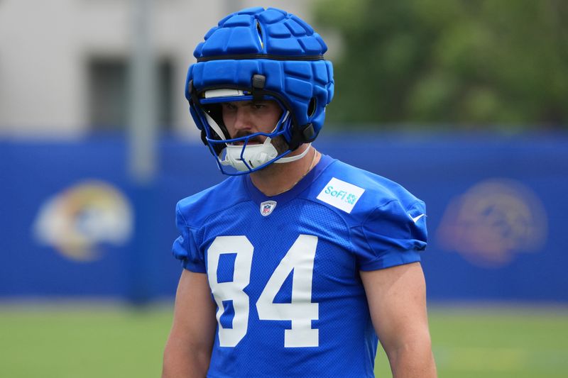 May 28, 2025; Woodland Hills, CA, USA; Los Angeles Rams tight end Colby Parkinson (84) watches an offensive drill during organized team activities at Rams Practice Facility. Mandatory Credit: Kirby Lee-Imagn Images
