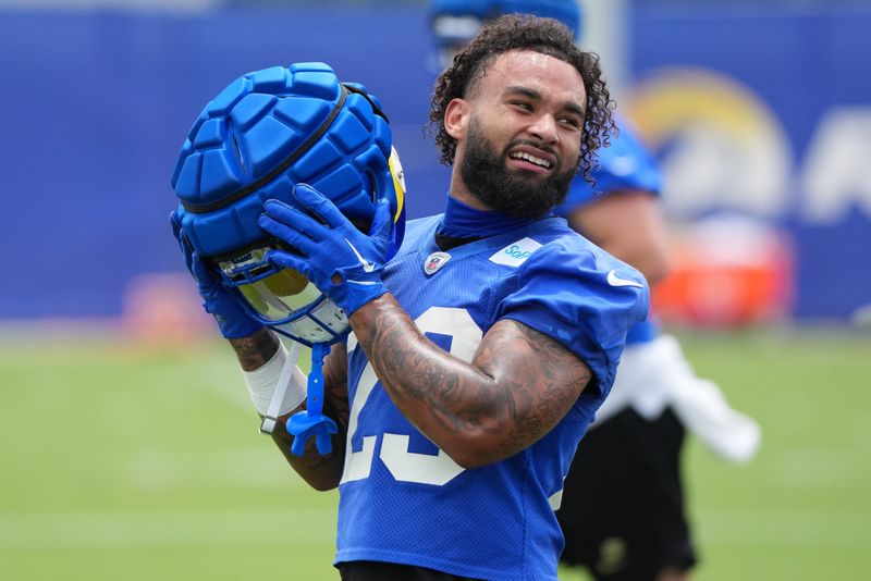 May 28, 2025; Woodland Hills, CA, USA; Los Angeles Rams running back Kyren Williams (23) takes a break during organized team activities at Rams Practice Facility. Mandatory Credit: Kirby Lee-Imagn Images