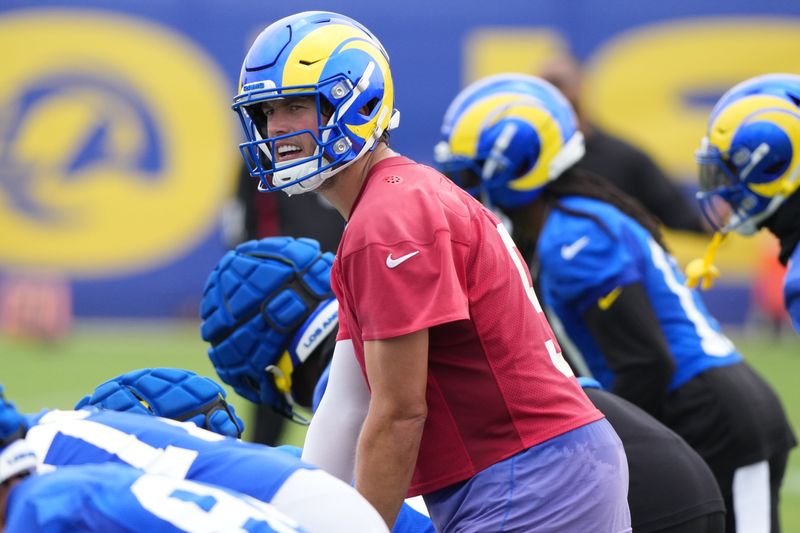 May 28, 2025; Woodland Hills, CA, USA; Los Angeles Rams quarterback Matt Stafford (9) calls the play from the line of scrimmage during organized team activities at Rams Practice Facility. Mandatory Credit: Kirby Lee-Imagn Images