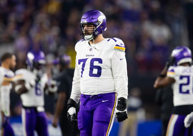 Jan 13, 2025; Glendale, AZ, USA; Minnesota Vikings tackle David Quessenberry (76) against the Los Angeles Rams during an NFC wild card game at State Farm Stadium. Mandatory Credit: Mark J. Rebilas-Imagn Images