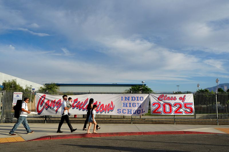 Family arrive for the Indio High School commencement ceremony in Indio, Calif., on Thurs., May 29, 2025.