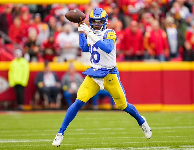 Nov 27, 2022; Kansas City, Missouri, USA; Los Angeles Rams quarterback Bryce Perkins (16) throws a pass during the first half against the Kansas City Chiefs at GEHA Field at Arrowhead Stadium. Mandatory Credit: Jay Biggerstaff-USA TODAY Sports