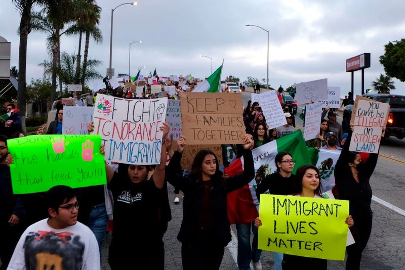 Pro-immigration demonstrators march down Third Street in Oxnard on Thursday, June 10, 2025.