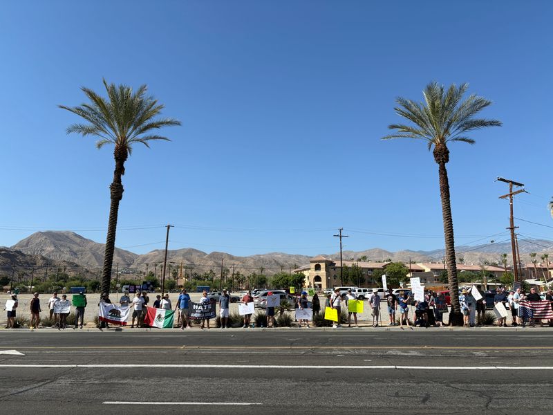 Hundreds of people gathered in the morning for the No Kings rally in Cathedral City in Southern California's Coachella Valley on Saturday. They lined the street near East Palm Canyon Drive and West Buddy Rogers Avenue, by Cathedral City Civic Center.