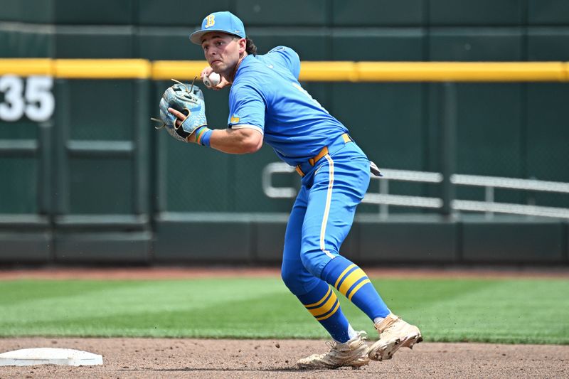 UCLA Bruins shortstop Roch Cholowsky (1) completes a double play against the Murray State Racers during the second inning at Charles Schwab Field.