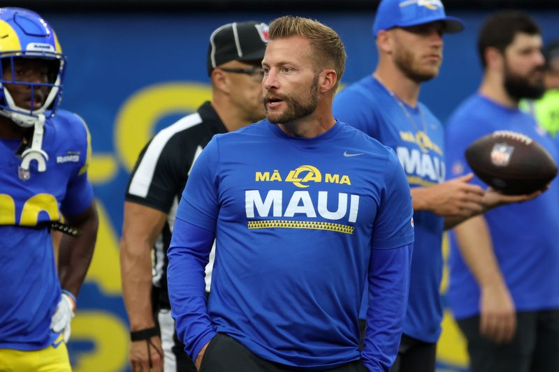 Aug 19, 2023; Inglewood, California, USA; Los Angeles Rams head coach Sean McVay wears special "Malama Maui" t-shirt to commemorate Maui before the game against the Las Vegas Raiders at SoFi Stadium. Mandatory Credit: Kiyoshi Mio-USA TODAY Sports