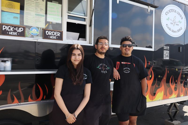 Rubi Soto, 18, and Robert Lovato, 28, with Cocina 1932 Cali Mex-BBQ owner Sebastian Gomez, 24, at their regular spot June 5, 2025, on San Miguel Ave. in Salinas, Calif.