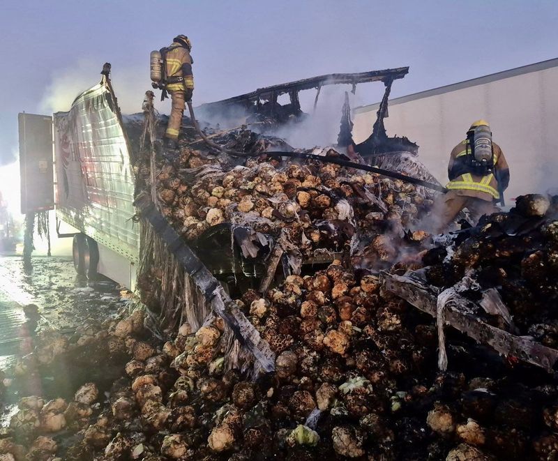 A big rig hauling produce exploded into flames after a collision with another big rig on the northbound 15 Freeway, just north of Baker, on Wednesday, June 18, 2025.