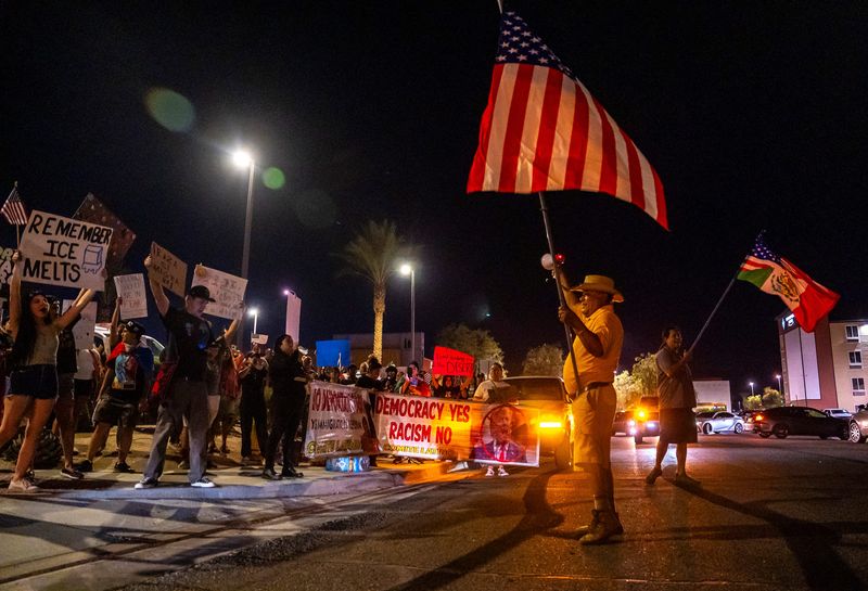 Jose Garduno of Comite Latino leads protestors in chants during the "ICE Melts in the Desert" protest in Indio, Calif., Wednesday, June 18, 2025. Comite Latino is a Coachella-based non-profit community movement dedicated to helping undocumented community members.