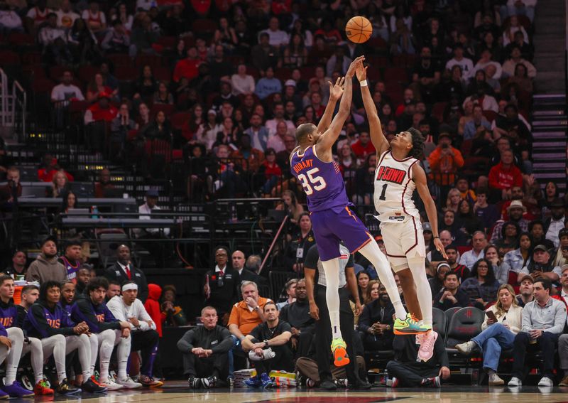 Feb 12, 2025; Houston, Texas, USA; Phoenix Suns forward Kevin Durant (35) makes a three point basket against Houston Rockets forward Amen Thompson (1) in the second half at Toyota Center. Mandatory Credit: Thomas Shea-Imagn Images