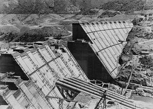 This photo of Shasta Dam while it was under construction is from the Bureau of Reclamation Archives. Completed in 1945, the 602-foot-high dam regulates flows from the Sacramento River, north of Redding.