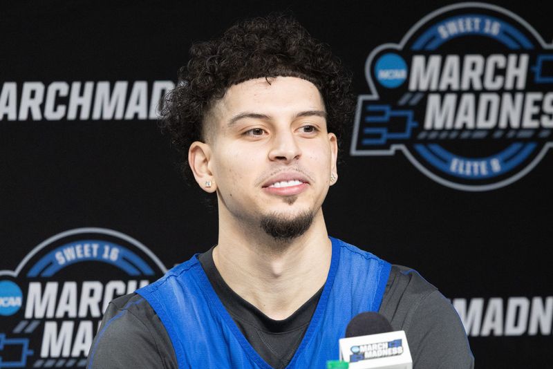 Kentucky Wildcats guard Koby Brea (4) talks to the media during practice day at Lucas Oil Stadium in Indianapolis on March 27, 2025.