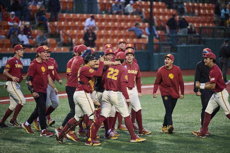 May 31, 2025; Corvallis, OR, USA; USC pitcher Caden Hunter (22) celebrates with teammates after a game against Saint Mary's at the NCAA Corvallis Regional at Goss Stadium. Mandatory Credit: Troy Wayrynen-Imagn Images