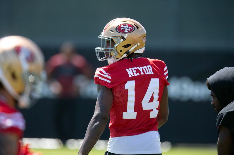 Jun 10, 2025; Santa Clara, CA, USA; San Francisco 49ers wide receiver Isaiah Neyor (14) awaits his turn in passing drills during an OTA at Levi's Stadium. Mandatory Credit: D. Ross Cameron-Imagn Images