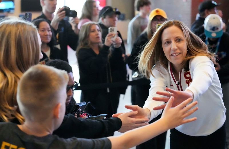 USC Trojans head coach Lindsay Gottlieb greets fans before the 2025 TIAA Big Ten Women's Basketball Tournament final game against the UCLA Bruins on Sunday, March 9, 2025, at Gainbridge Fieldhouse in Indianapolis. UCLA defeated USC 72-67.