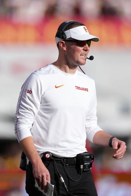Nov 30, 2024; Los Angeles, California, USA; Southern California Trojans head coach Lincoln Riley reacts against the Notre Dame Fighting Irish in the second half at United Airlines Field at Los Angeles Memorial Coliseum. Mandatory Credit: Kirby Lee-Imagn Images