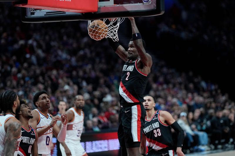 Feb 1, 2025; Portland, Oregon, USA; Portland Trail Blazers center Deandre Ayton (2) dunks the ball during the second half against the Phoenix Suns at Moda Center. Mandatory Credit: Soobum Im-Imagn Images