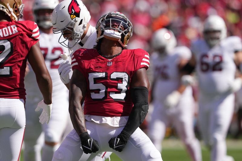 Oct 6, 2024; Santa Clara, California, USA; San Francisco 49ers linebacker Dee Winters (53) reacts after a tackle against the Arizona Cardinals during the first quarter at Levi's Stadium. Mandatory Credit: Darren Yamashita-Imagn Images