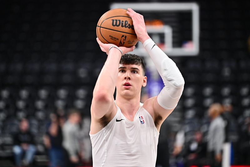 Feb 26, 2025; Salt Lake City, Utah, USA; Sacramento Kings forward Jake LaRavia (33) warms up before a game against the Utah Jazz at Delta Center. Mandatory Credit: Jamie Sabau-Imagn Images