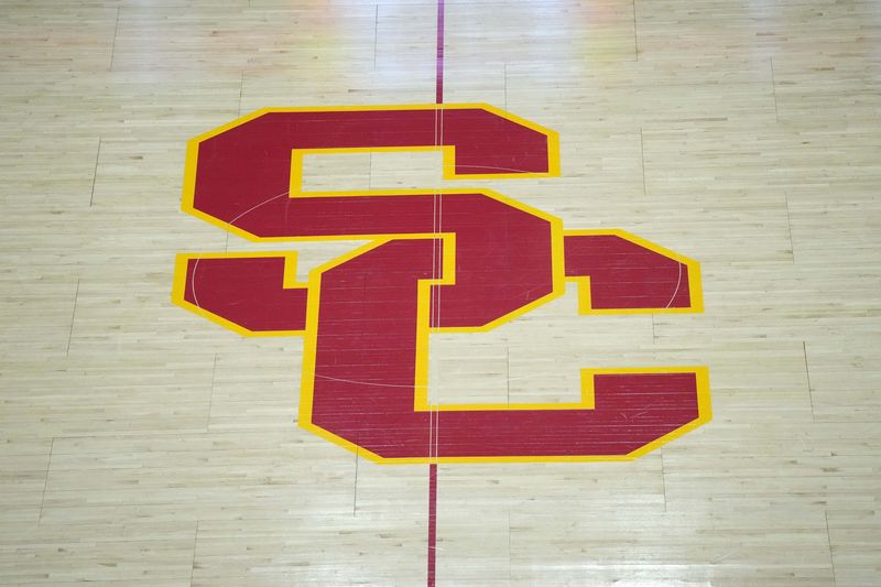 Jan 27, 2025; Los Angeles, California, USA; The USC Trojans logo at midcourt at the Galen Center. Mandatory Credit: Kirby Lee-Imagn Images