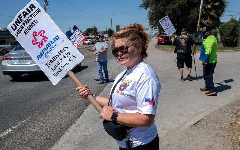 Striking workers picket the Republic Services Stockton facility at 1145 W. Charter Way in Stockton.