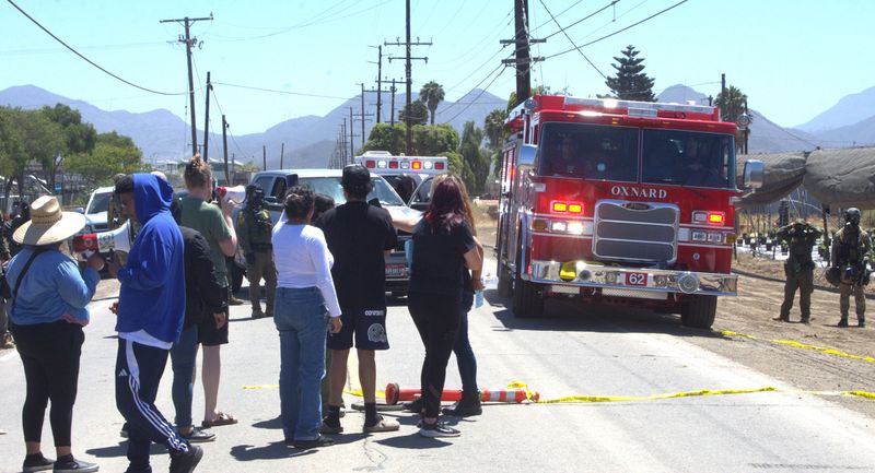 The Oxnard Fire Department provides service at the protest triggered by an immigration raid near Camarillo on July 10.