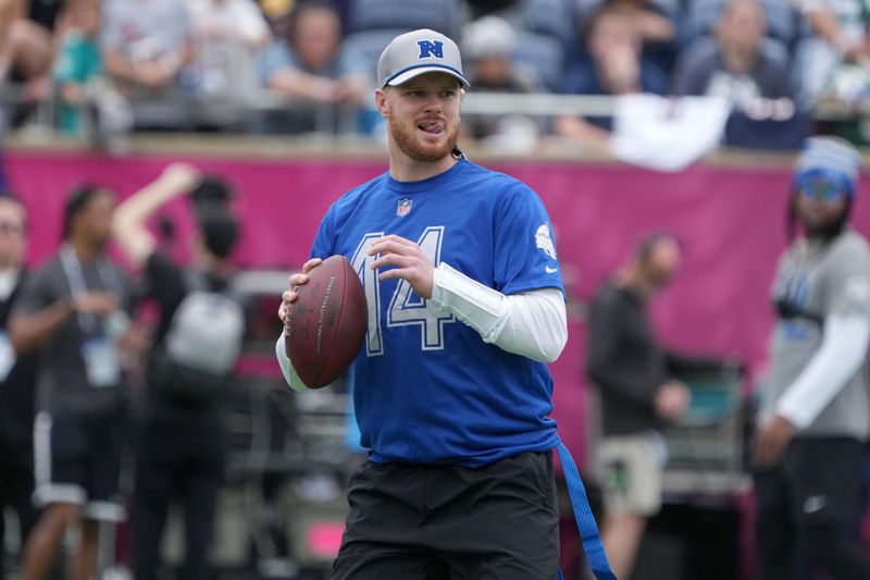Feb 1, 2025; Orlando, FL, USA; Minnesota Vikings quarterback Sam Darnold (14) throws the ball during NFC Practice for the Pro Bowl Games at Camping World Stadium. Mandatory Credit: Kirby Lee-Imagn Images