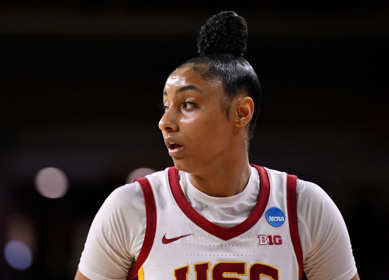 Mar 22, 2025; Los Angeles, California, USA; USC Trojans guard JuJu Watkins (12) during the second quarter of an NCAA Tournament game against the UNC Greensboro Spartans at Galen Center. Mandatory Credit: Robert Hanashiro-Imagn Images