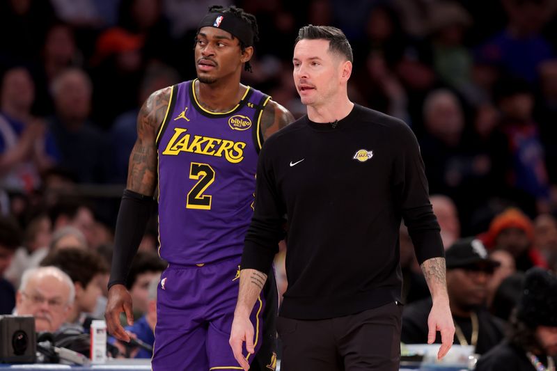 Feb 1, 2025; New York, New York, USA; Los Angeles Lakers head coach J.J. Reddick talks to forward Jarred Vanderbilt (2) during the third quarter against the New York Knicks at Madison Square Garden. Mandatory Credit: Brad Penner-Imagn Images