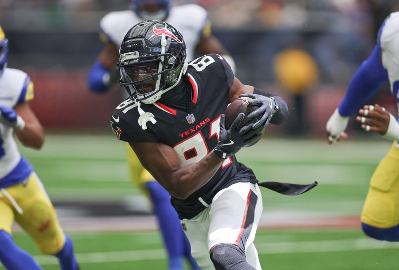 Aug 24, 2024; Houston, Texas, USA; Houston Texans wide receiver Quintez Cephus (81) runs with the ball during the third quarter against the Los Angeles Rams at NRG Stadium. Mandatory Credit: Troy Taormina-USA TODAY Sports