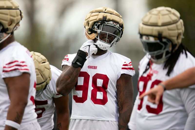 Jul 24, 2025; Santa Clara, CA, USA; San Francisco 49ers defensive end Mykel Williams (98) awaits his turn at pass rushing drills during the second day of training camp. Mandatory Credit: D. Ross Cameron-Imagn Images