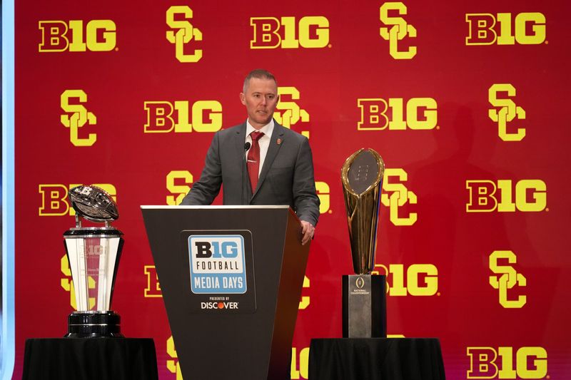 Jul 24, 2025; Las Vegas, NV, USA; USC head coach Lincoln Riley speaks to the media during the Big Ten NCAA college football media days at Mandalay Bay Resort. Mandatory Credit: Lucas Peltier-Imagn Images