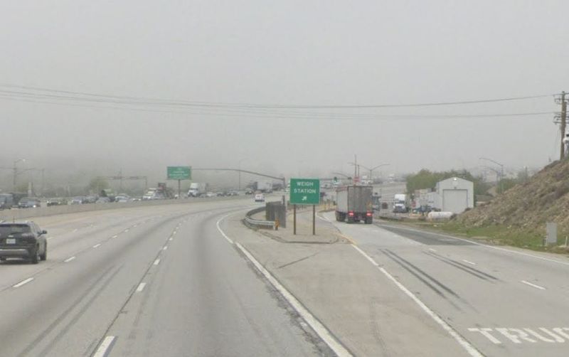 Weight station scales along the northbound 15 Freeway, just south of the 138 Freeway, at the bottom of the Cajon Pass, pictured in a Google Street View image.
