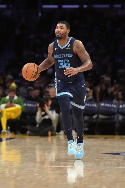 Dec 15, 2024; Los Angeles, California, USA; Memphis Grizzlies guard Marcus Smart (36) dribbles against the Los Angeles Lakers in the second half at Crypto.com Arena. Mandatory Credit: Kirby Lee-Imagn Images
