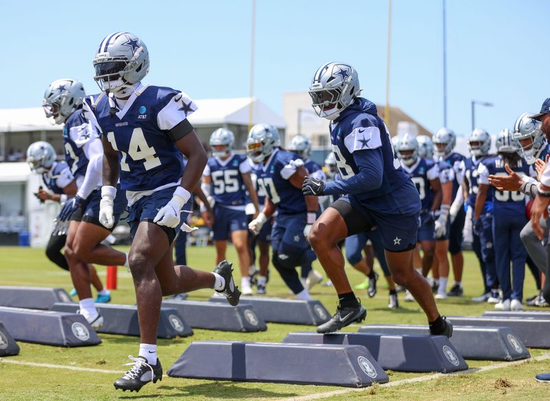 Dallas Cowboys players warm up at the beginning of an open practice on Saturday, July 26, 2025, at River Ridge Playing Fields in Oxnard.