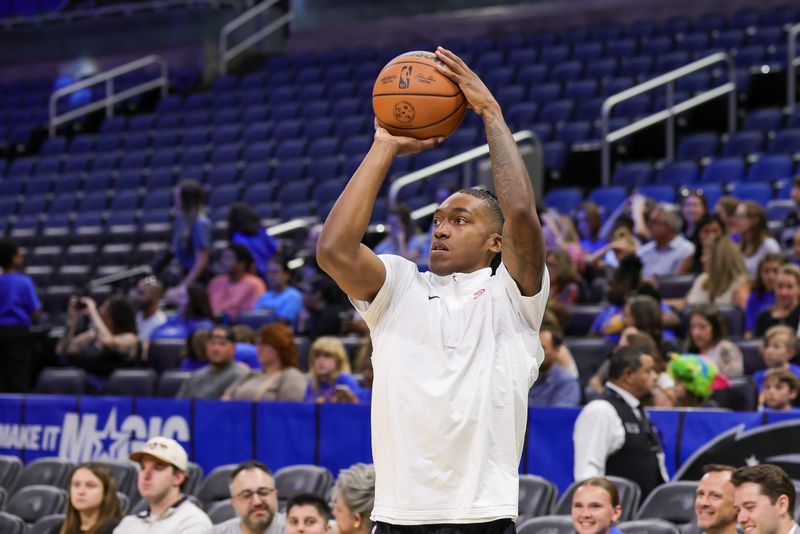 Apr 8, 2025; Orlando, Florida, USA; Atlanta Hawks guard Terance Mann (14) warms up before the game against the Orlando Magic at Kia Center. Mandatory Credit: Mike Watters-Imagn Images