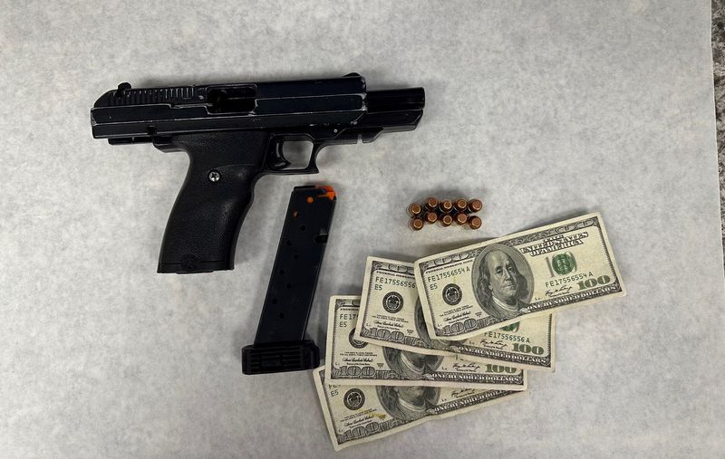 Police seized a handgun from an ex-convict suspected of passing counterfeit money in Barstow on Thursday, Aug. 27, 2025.