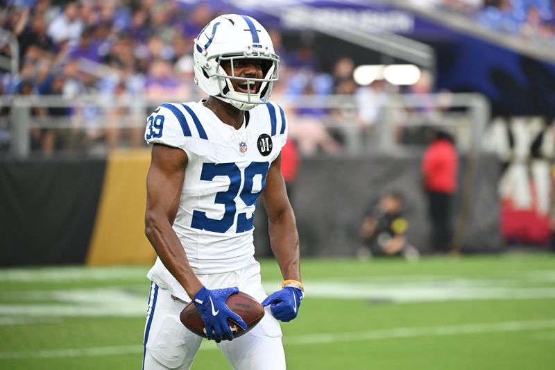 Aug 7, 2025; Baltimore, Maryland, USA; Indianapolis Colts cornerback Alex Johnson (39) reacts after intercepting a pass against the Baltimore Ravens during the first quarter at M&T Bank Stadium. Mandatory Credit: Rafael Suanes-Imagn Images