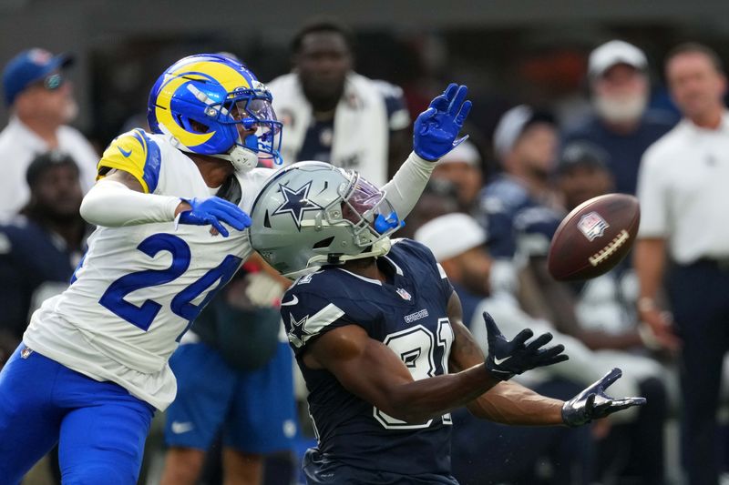 Aug 9, 2025; Inglewood, California, USA; Dallas Cowboys wide receiver Jonathan Mingo (81) attempts to catch the ball against Los Angeles Rams cornerback Shaun Jolly (24) in the first half at SoFi Stadium. Mandatory Credit: Kirby Lee-Imagn Images