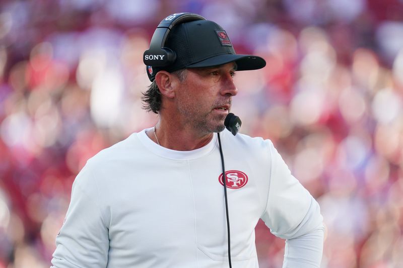Aug 9, 2025; Santa Clara, California, USA; San Francisco 49ers head coach Kyle Shanahan watches from the sidelines in the first quarter against the Denver Broncos at Levi's Stadium. Mandatory Credit: David Gonzales-Imagn Images