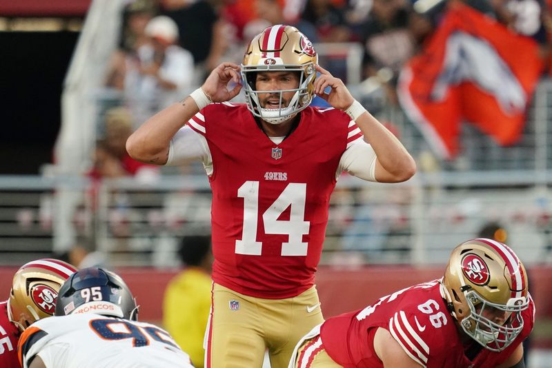 Aug 9, 2025; Santa Clara, California, USA; San Francisco 49ers quarterback Carter Bradley (14) signals to the offense in the third quarter against the Denver Broncos at Levi's Stadium. Mandatory Credit: David Gonzales-Imagn Images