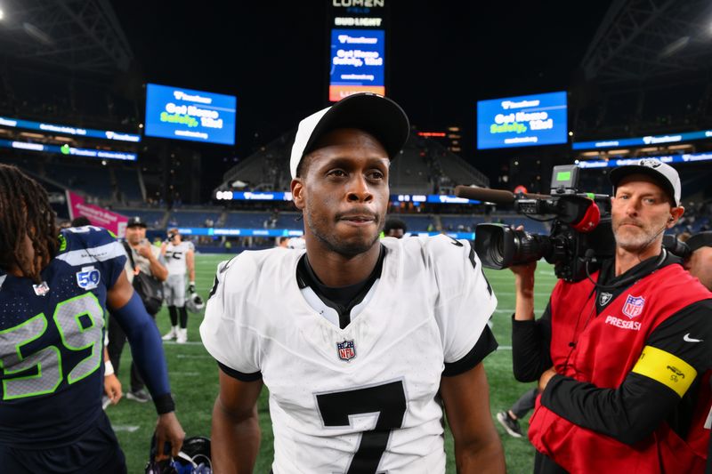 Aug 7, 2025; Seattle, Washington, USA; Las Vegas Raiders quarterback Geno Smith (7) after the game against the Seattle Seahawks at Lumen Field. Mandatory Credit: Steven Bisig-Imagn Images