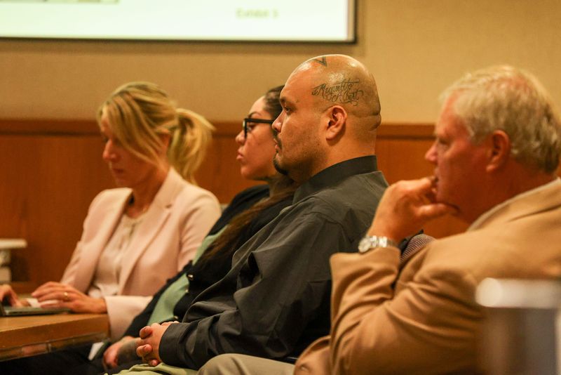 Defendants Margarita Jimenez (middle, left) and Jorge Garfias (middle, right) are on trial for the murder and kidnapping of food service worker Yanelly Vargas. They are pictured beside attorneys Rebekah Mathis and Willard Wiksell.