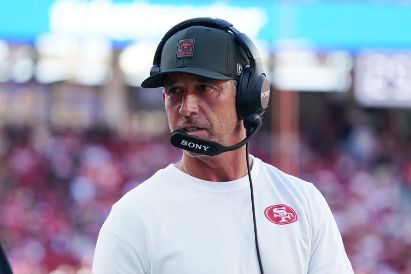 Aug 9, 2025; Santa Clara, California, USA; San Francisco 49ers head coach Kyle Shanahan watches from the sidelines in the first quarter against the Denver Broncos at Levi's Stadium. Mandatory Credit: David Gonzales-Imagn Images