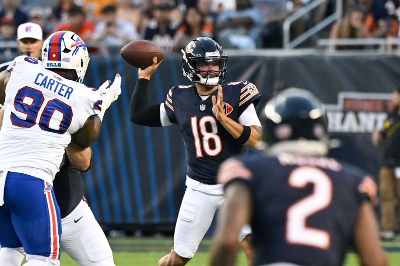 Aug 17, 2025; Chicago, Illinois, USA; Chicago Bears quarterback Caleb Williams (18) throws during the first half against the Buffalo Bills at Soldier Field. Mandatory Credit: Matt Marton-Imagn Images