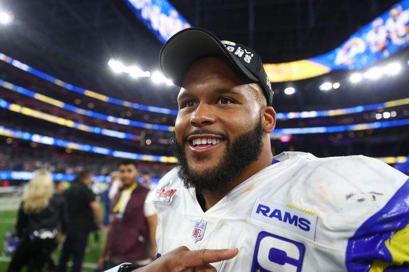 Feb 13, 2022; Inglewood, CA, USA; Los Angeles Rams defensive end Aaron Donald celebrates after defeating the Cincinnati Bengals in Super Bowl LVI at SoFi Stadium. Mandatory Credit: Mark J. Rebilas-USA TODAY Sports